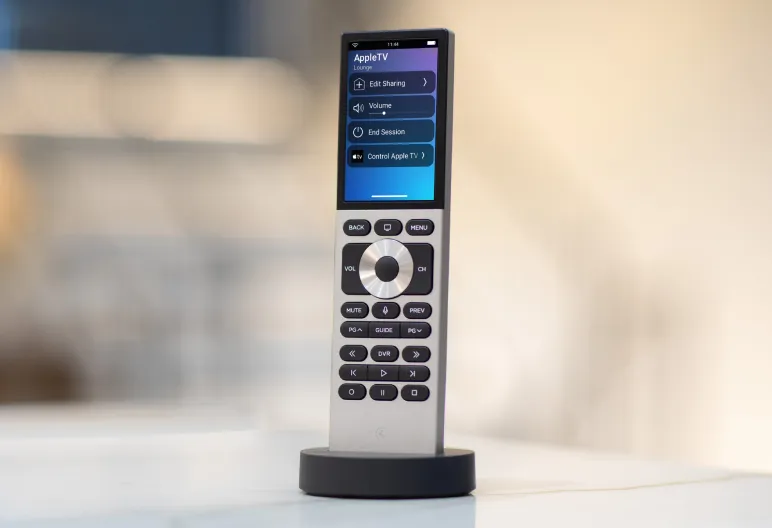 Control4 Halo remote on its charging base