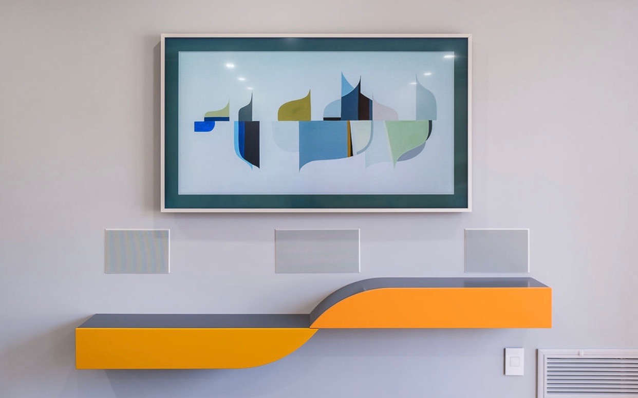 Integrated display and in-wall speakers