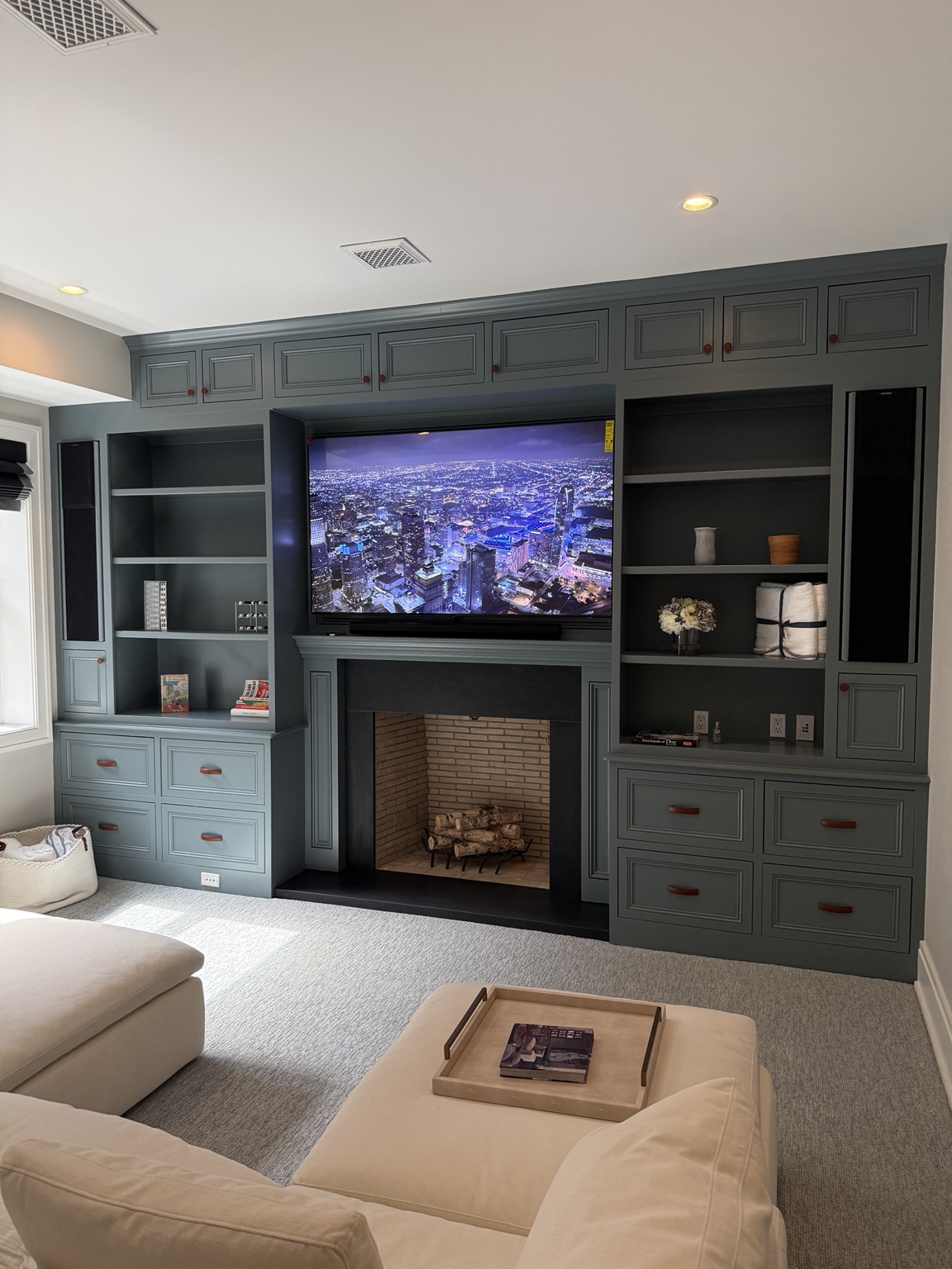 Fireplace television and built-in cabinetry