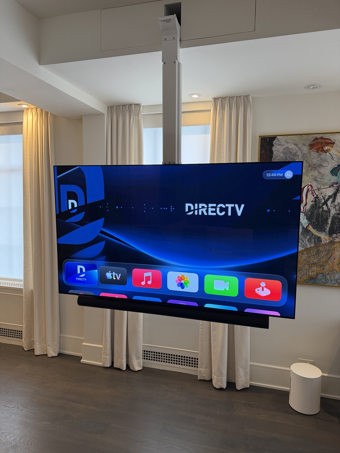 Ceiling-mounted television